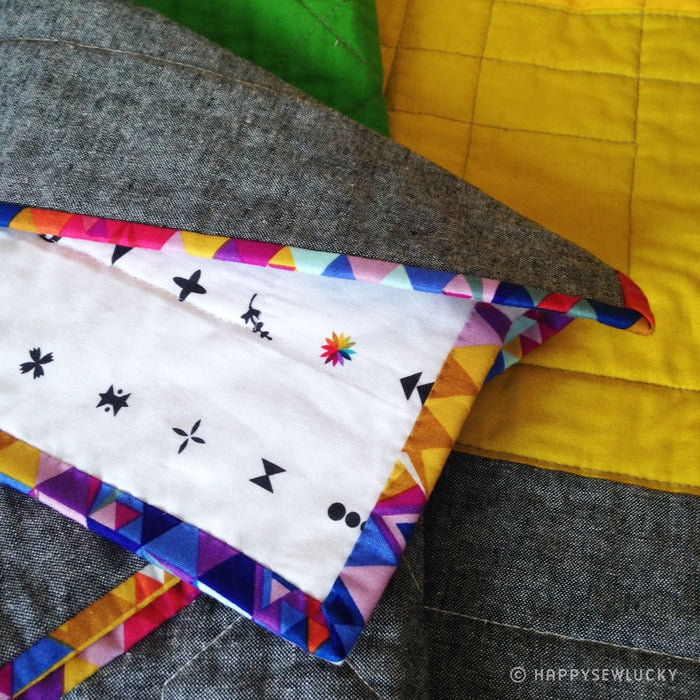 Rainbow Mash-up Quilt by Happy Sew Lucky