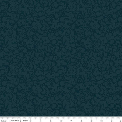 Dark navy fabric with a dense, tonal floral and leaf pattern, shown with a 12-inch ruler at the bottom to indicate scale.