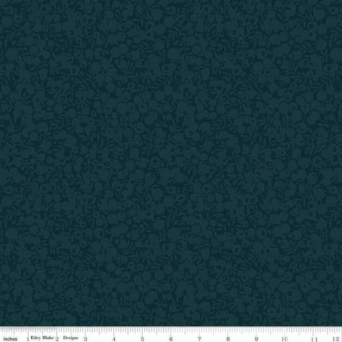 Dark navy fabric with a dense, tonal floral and leaf pattern, shown with a 12-inch ruler at the bottom to indicate scale.