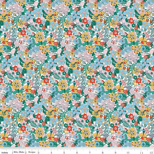 Colorful floral pattern fabric with a ruler at the bottom for scale.