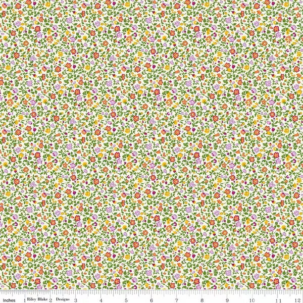 Floral pattern fabric with small flowers on a  yellow background