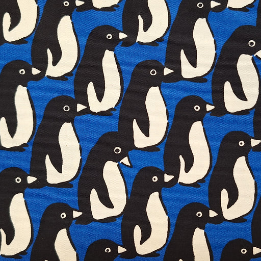 Pattern of penguins on a blue background