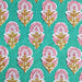 Patterned fabric with pink and yellow floral design on a teal background