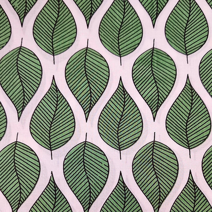 Pattern of green leaves on a white background