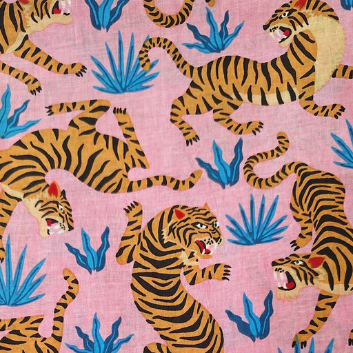 Pattern of tigers and blue plants on a pink background