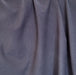 close up of navy jersey fabric draped 
