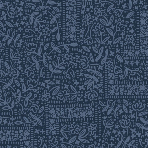 Dark blue fabric with subtle floral pattern