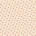 A repeating pattern of small brown circles with tiny blue centers on a light peach-beige background, filling the entire frame.