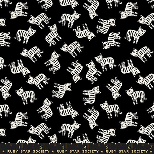 cartoon black and white striped cats on a black background