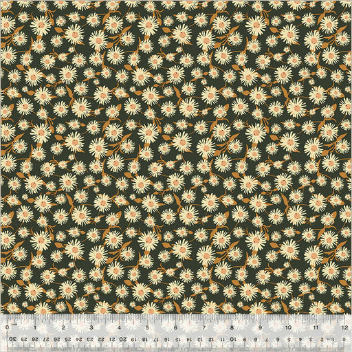 Floral pattern fabric with a ruler at the bottom for scale.