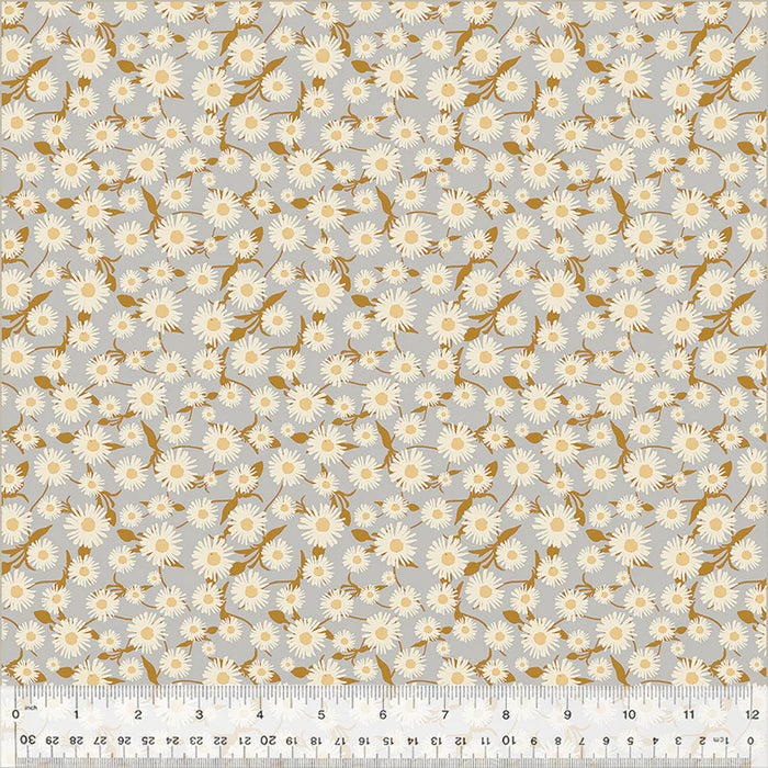 Pattern of small white flowers with brown stems on a gray background, with a ruler at the bottom for scale.