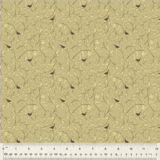 Patterned fabric with leaves and birds on a beige background, ruler at the bottom for scale.