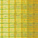 Abstract pattern of green and yellow horizontal lines on a textured background