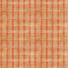 Textured fabric with a plaid pattern in orange and beige.