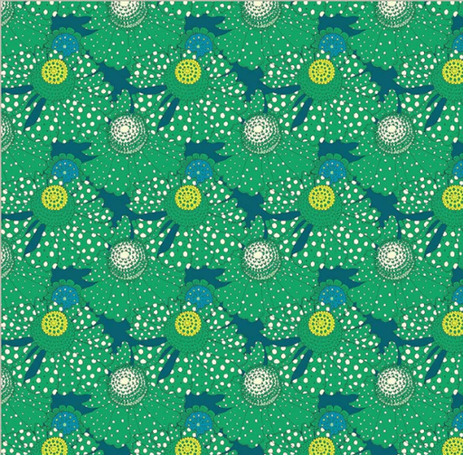 Patterned paper with blue fish and white polka dots on a green background