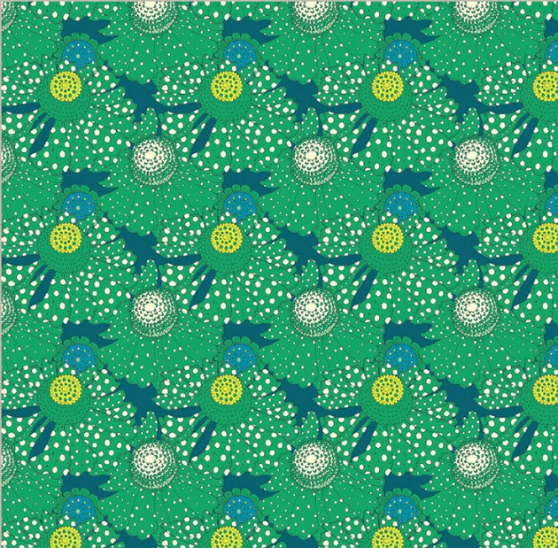 Patterned paper with blue fish and white polka dots on a green background