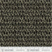 Fabric with a geometric pattern on a black background, featuring Windham Fabrics branding.