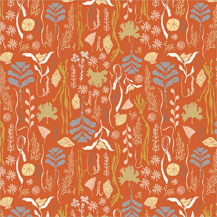 fabric closeup of coral and sea plants on a deep orange background