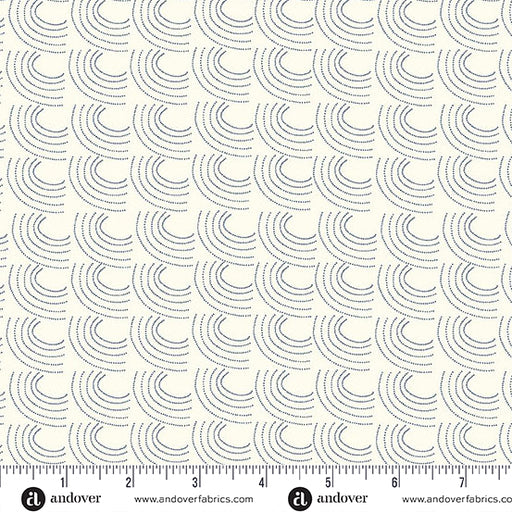 Patterned fabric with circular shapes on a white background, featuring Andover Fabrics branding.