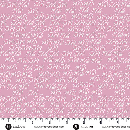 Pink fabric with white wave pattern and a ruler at the bottom for scale.