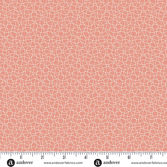Coral fabric with star, moon, and heart pattern and Andover Fabrics logo.