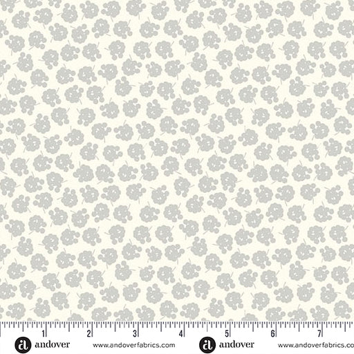 Floral patterned fabric with a ruler at the bottom for scale, on a white background.