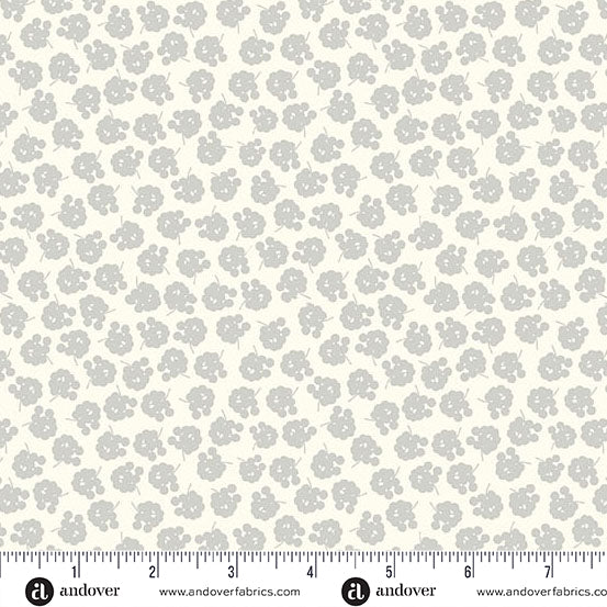 Floral patterned fabric with a ruler at the bottom for scale, on a white background.