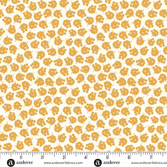 Patterned fabric with yellow flowers on a white background, featuring Andover Fabrics branding.
