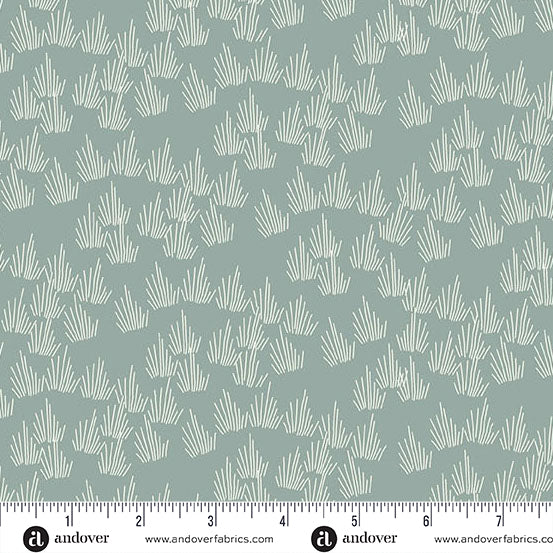 Fabric pattern with geometric design on a gray background, featuring Andover Fabrics branding.