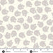 Floral pattern fabric swatch with a ruler for scale on a white background