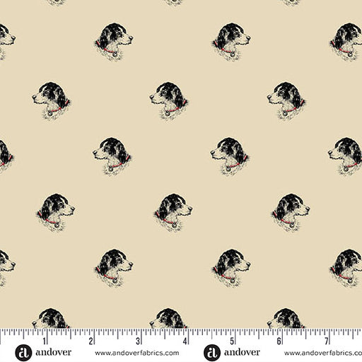 Pattern of black and white dogs on beige fabric with a ruler for scale.
