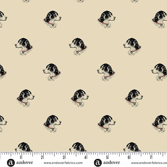 Pattern of black and white dogs on beige fabric with a ruler for scale.