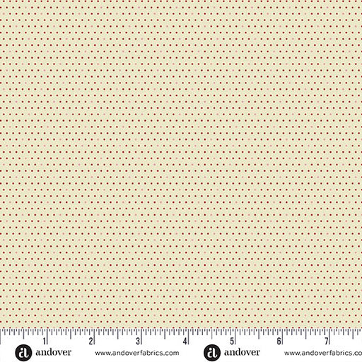 Micro dots of deep red on beige fabric with a ruler at the bottom for scale.
