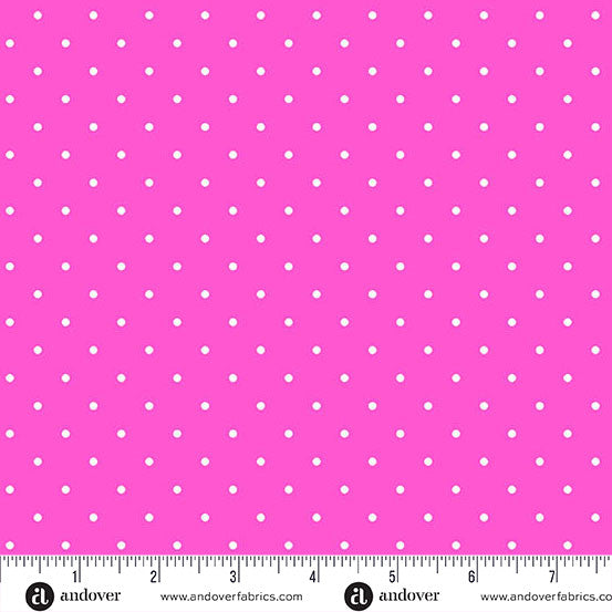 polka dot fabric with white dots on hot pink background and a measuring tape at the bottom