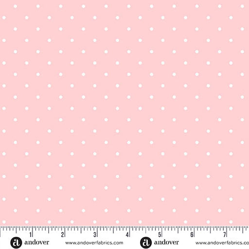 pale pink polka dot fabric with a measuring tape at the bottom