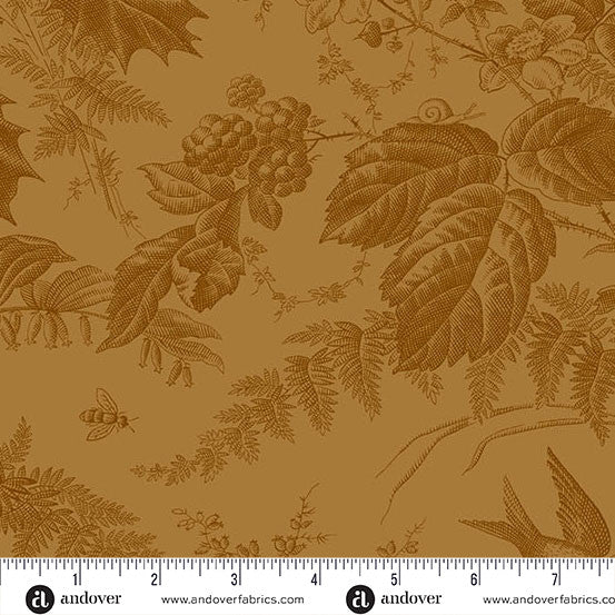 Brown fabric with nature-themed pattern featuring leaves, berries, and a bee, with a ruler at the bottom for scale.