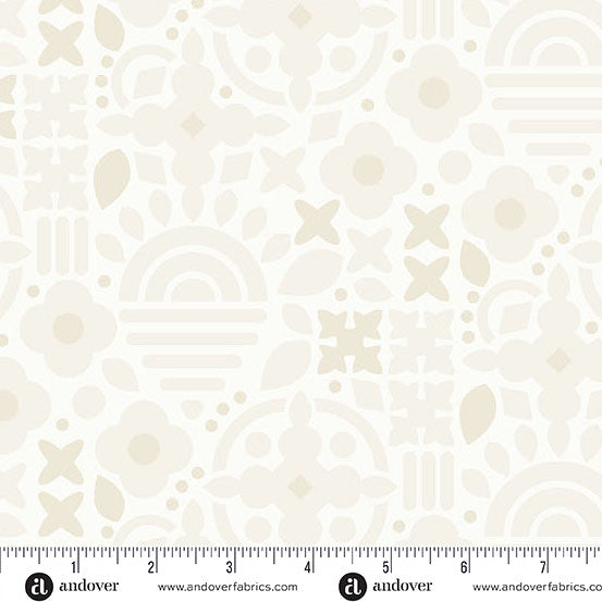 Geometric pattern fabric swatch with a ruler for scale on a white background