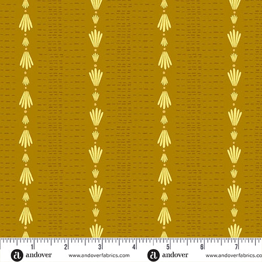 Fabric swatch with gold geometric pattern on a mustard background, featuring Andover Fabrics branding.