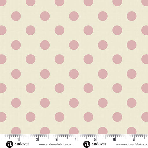 Fabric with pink polka dots on a beige background, featuring Andover Fabrics branding.