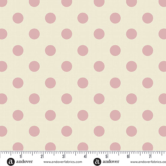 Fabric with pink polka dots on a beige background, featuring Andover Fabrics branding.