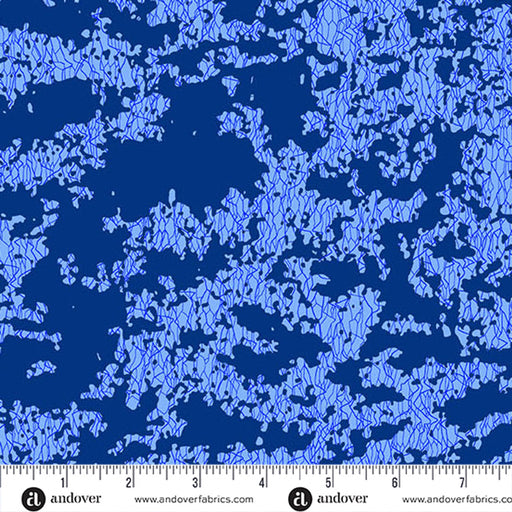 Blue textured fabric pattern with a ruler at the bottom for scale