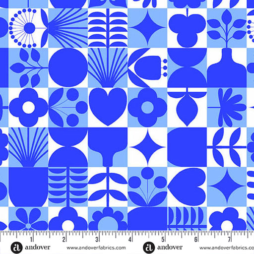 Blue geometric pattern fabric with a ruler at the bottom