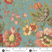 Floral pattern fabric with a ruler at the bottom for scale, on a teal background.