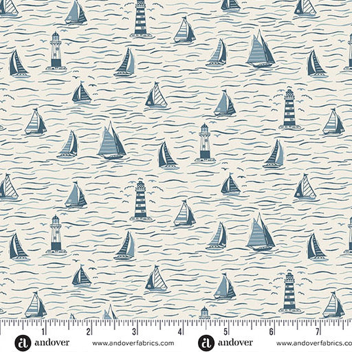 Nautical pattern with sailboats and lighthouses on a fabric swatch.