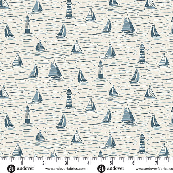 Nautical pattern with sailboats and lighthouses on a fabric swatch.