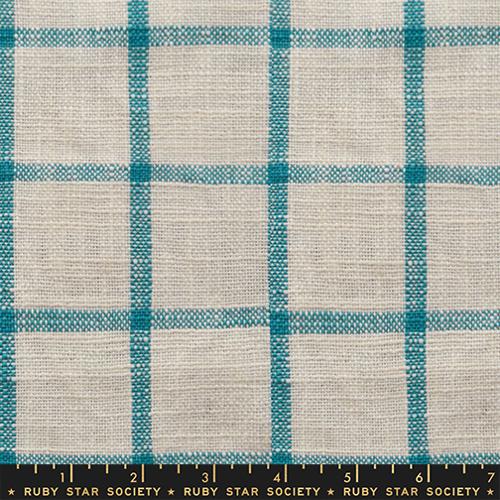 Fabric with blue and beige check pattern, labeled Ruby Star Society.