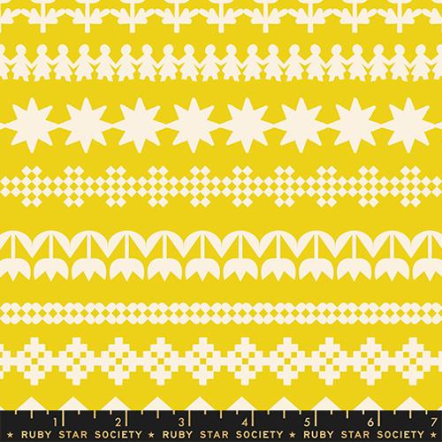 Patterned fabric with white designs on a yellow background, featuring Ruby Star Society branding.