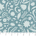 White floral and leaf pattern on a blue background