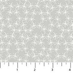 White floral pattern on gray fabric with a ruler at the bottom