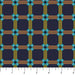 Fabric with a geometric pattern on a navy background, measured against a ruler.